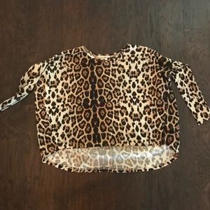 Leopard sweater so cute on! Back is longer